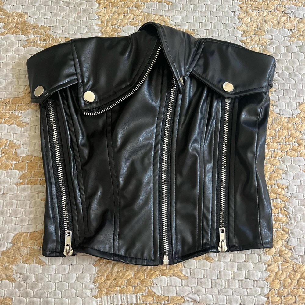 Black corset going out top
